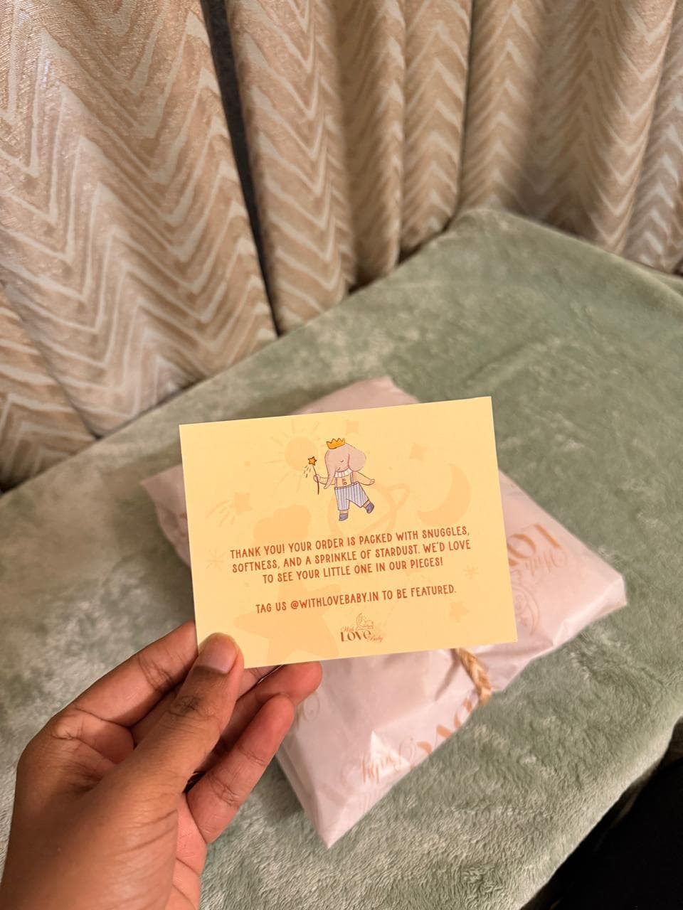 With Love Baby thank-you card alongside a wrapped gift package